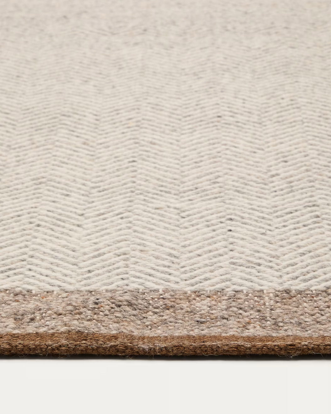Tappeto Nifelia jacquard in lana beige